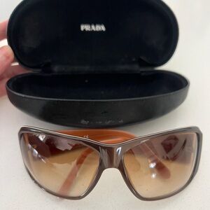 Prada Gradient Brown Sunglasses with black case.